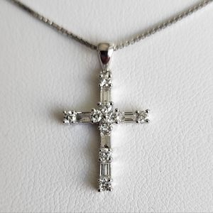 14 Kt White Gold Cross With Round & Baguette Diamonds. New with Tag